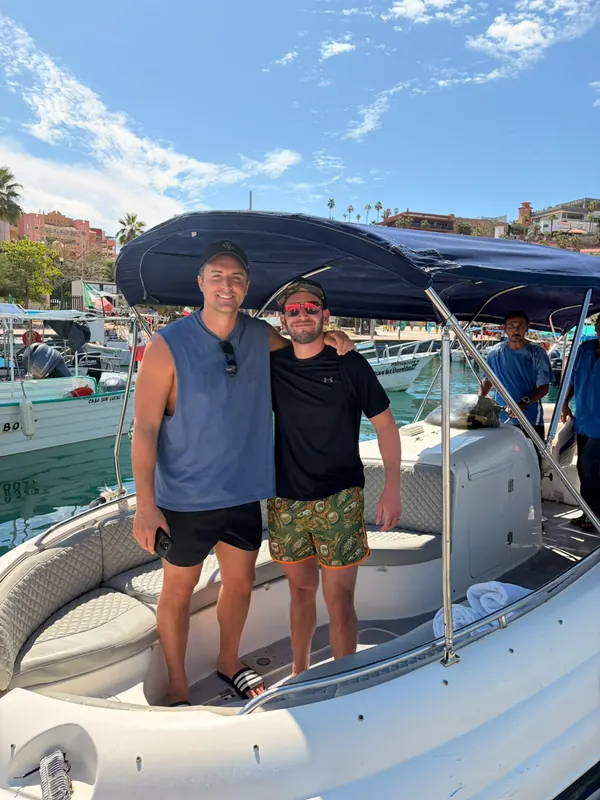 Two guests on board the Chaparral 28 at Marina Cabo San Lucas before leaving the dock