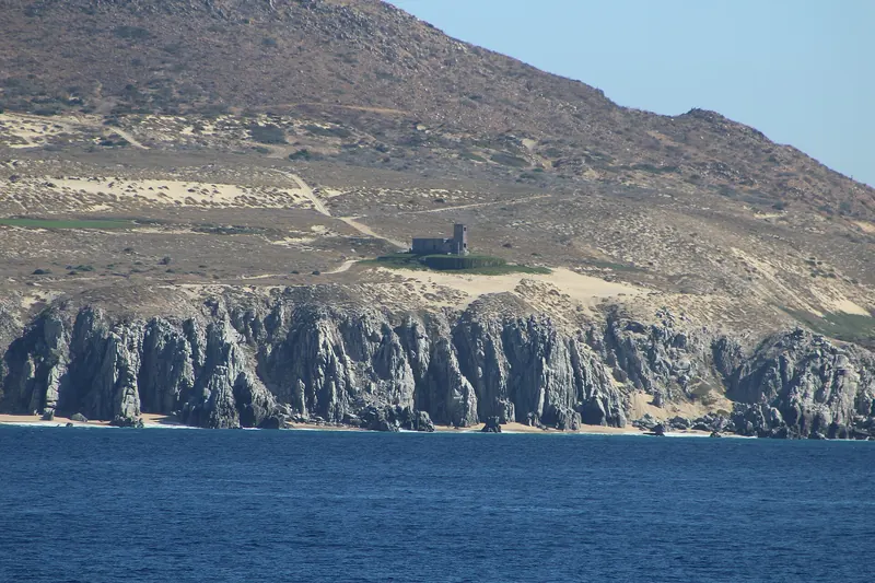 The old Cabo Falso lighthouse on the Pacific dunes, the stretch of coast where Diamante sits
