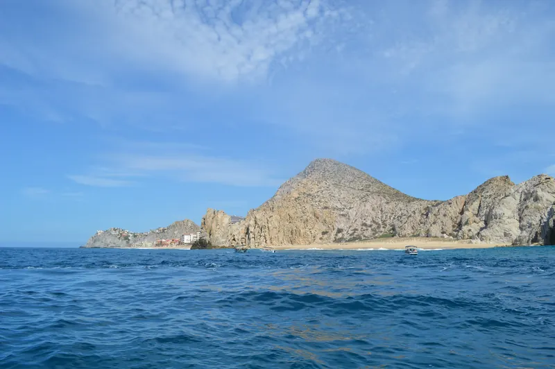 The Pacific side of Land's End seen from the water, where Divorce Beach faces the open ocean