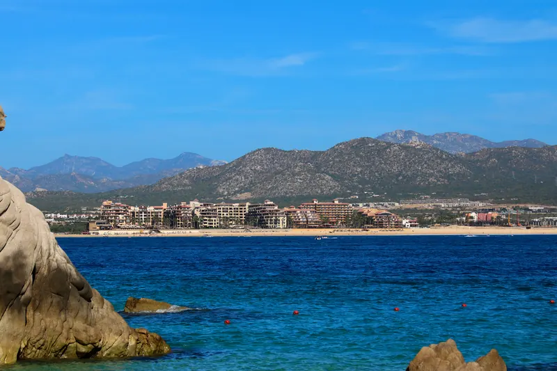 Médano Beach and its hotels seen across the bay
