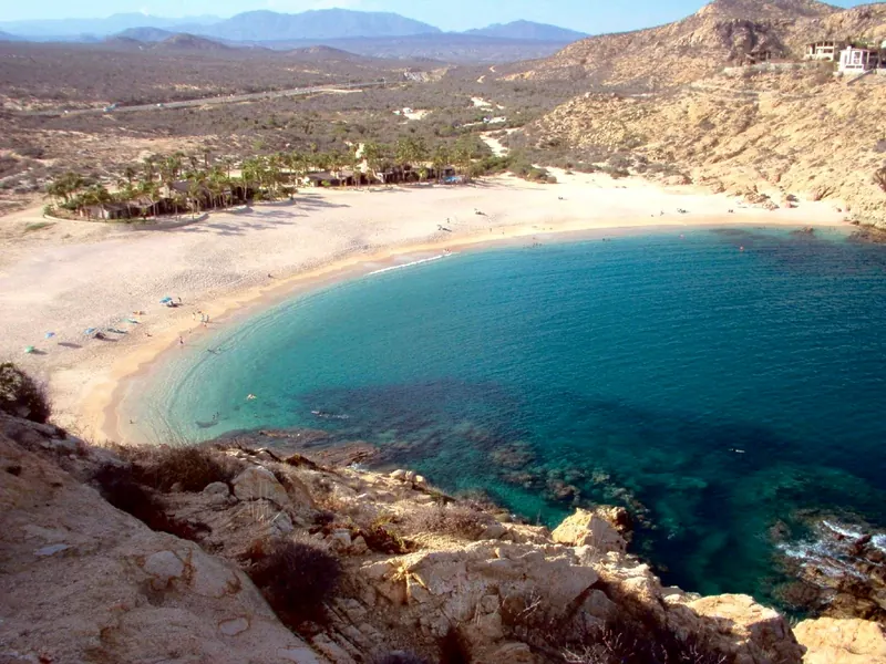 Santa María Bay from the cliffs: the horseshoe beach, reef and turquoise water