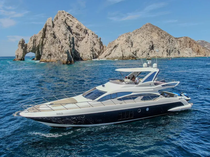 Azimut 70 flybridge motor yacht for private charter at the Arch, Cabo San Lucas